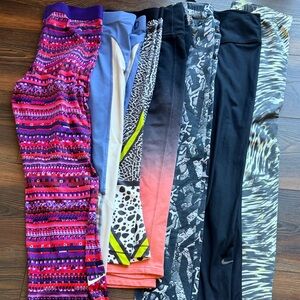 7 Pack Nike Leggings Size Medium Fun Patterns + Solid Black